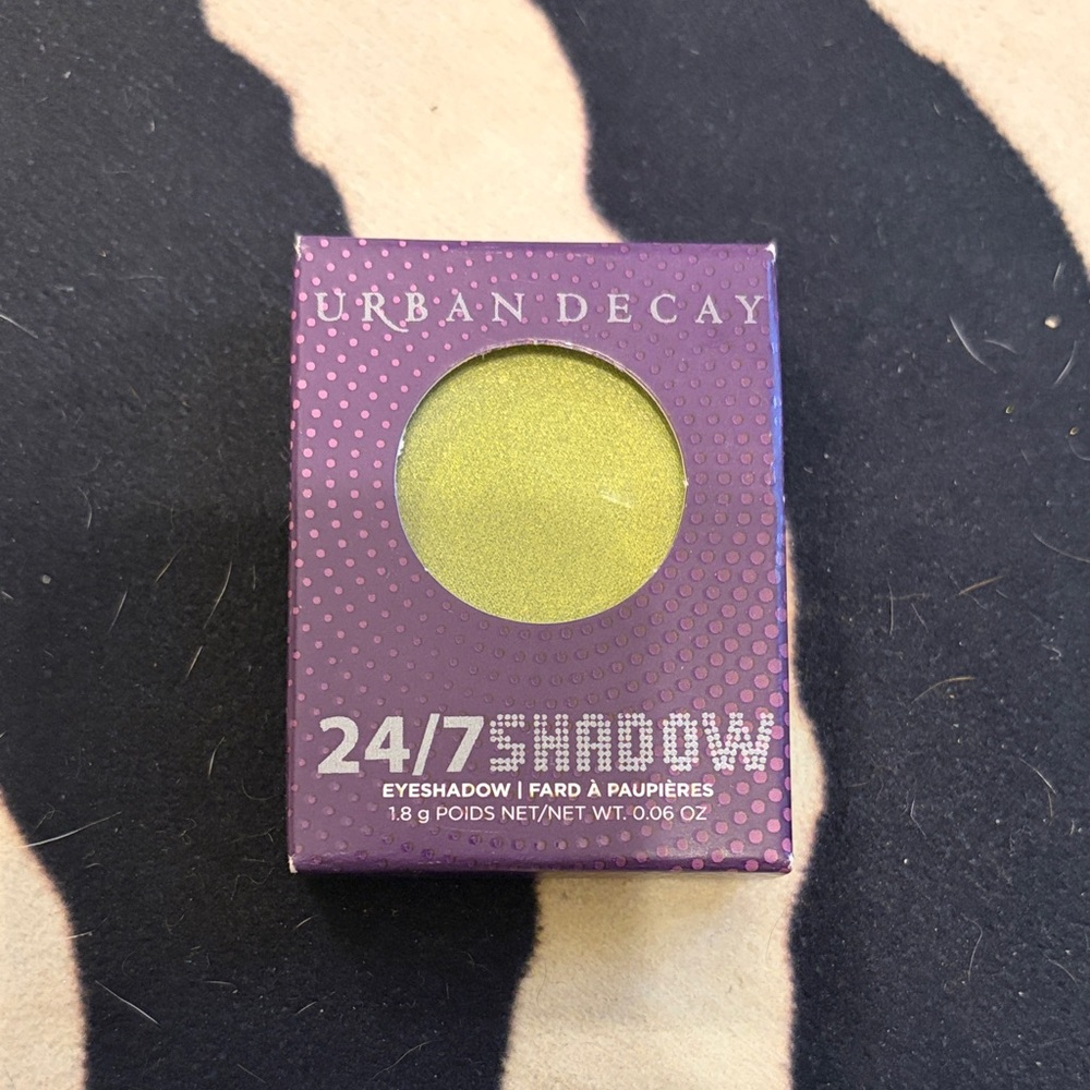 Urban Decay 24/7 Eyeshadow in shade FREAK a Shimmering Yellow green.